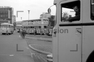 Buses and pedestrians in West Berlin: Historical image